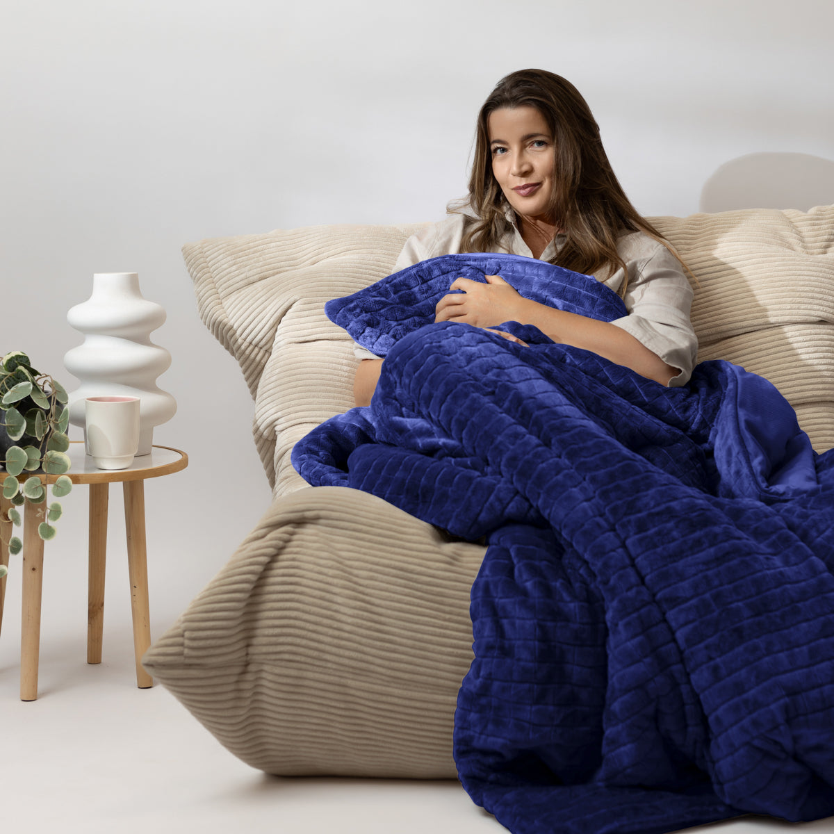 Gravity weighted store blanket